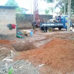 A gully is dug to take water to the machine.jpg